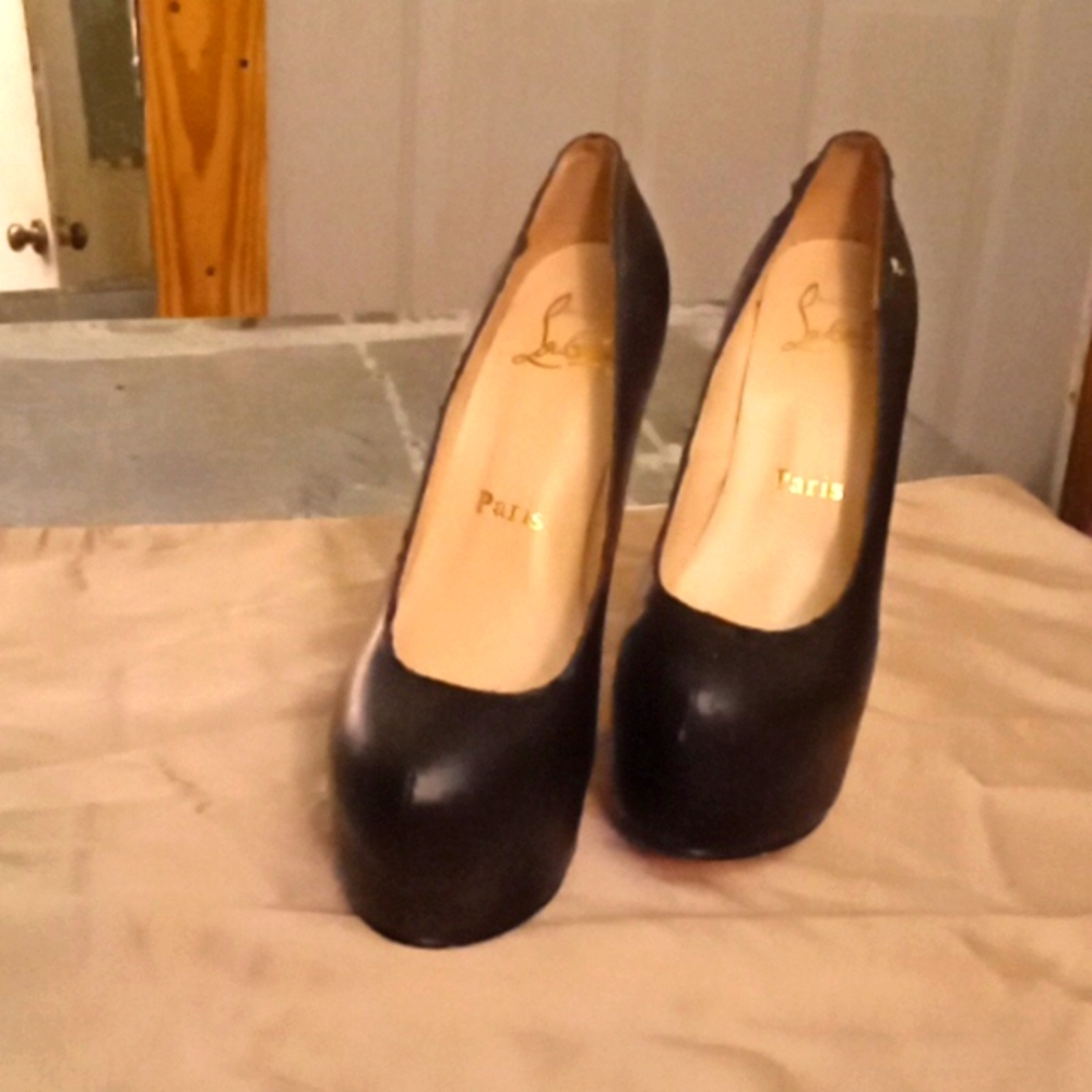 Christian Sebastian Paris red bottoms
